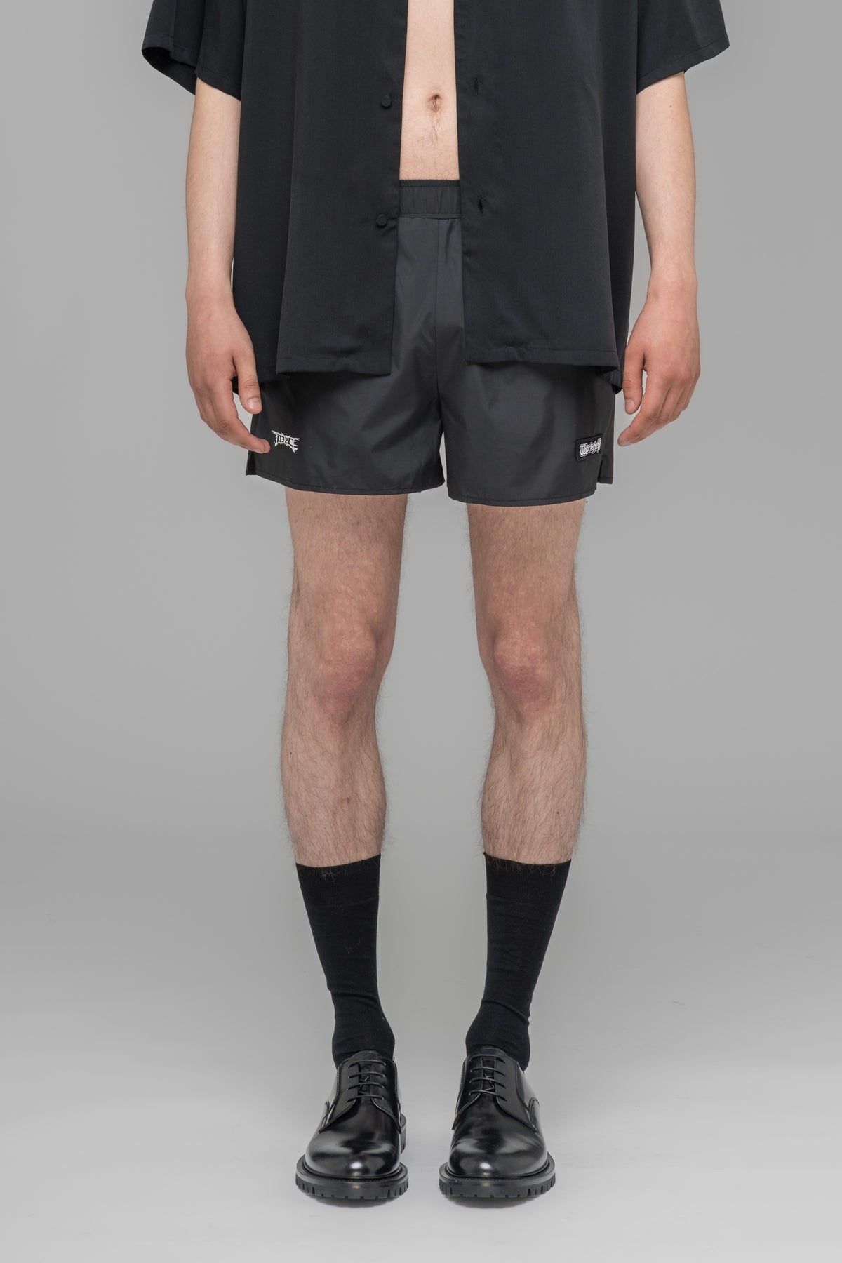 "NO MORE TEARS" SWIM SHORTS