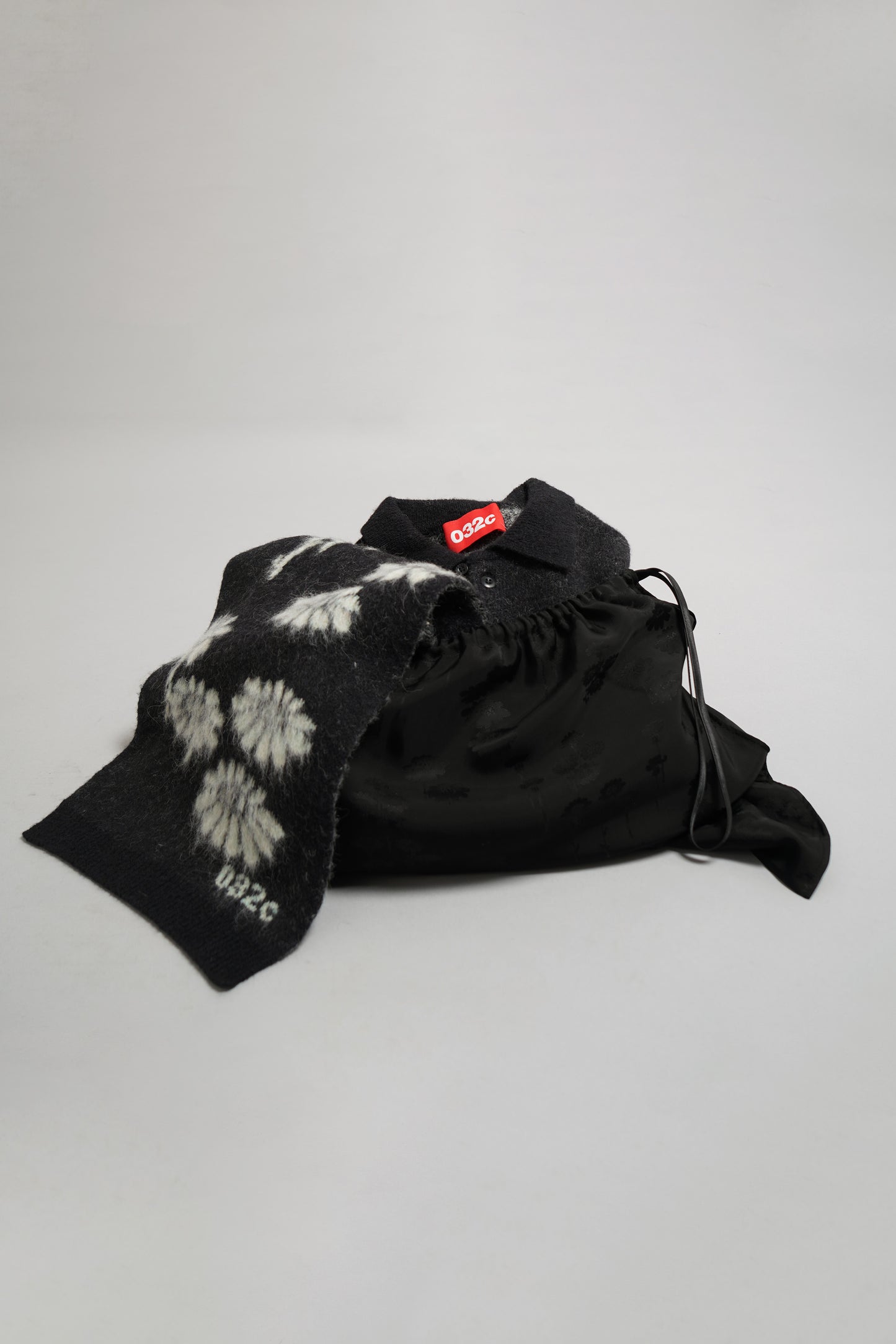 "MELTING DAISIES" KNIT LS POLO SHIRT